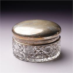 Silver topped glass trinket jar, small circular photograph frame and dessert fork