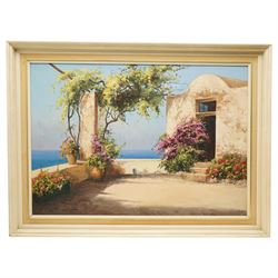 Guido Odierna (Italian 1913-1991): 'Capri' Terrace with Flowers, oil on canvas signed and titled, Harrods label verso 68cm x 97cm