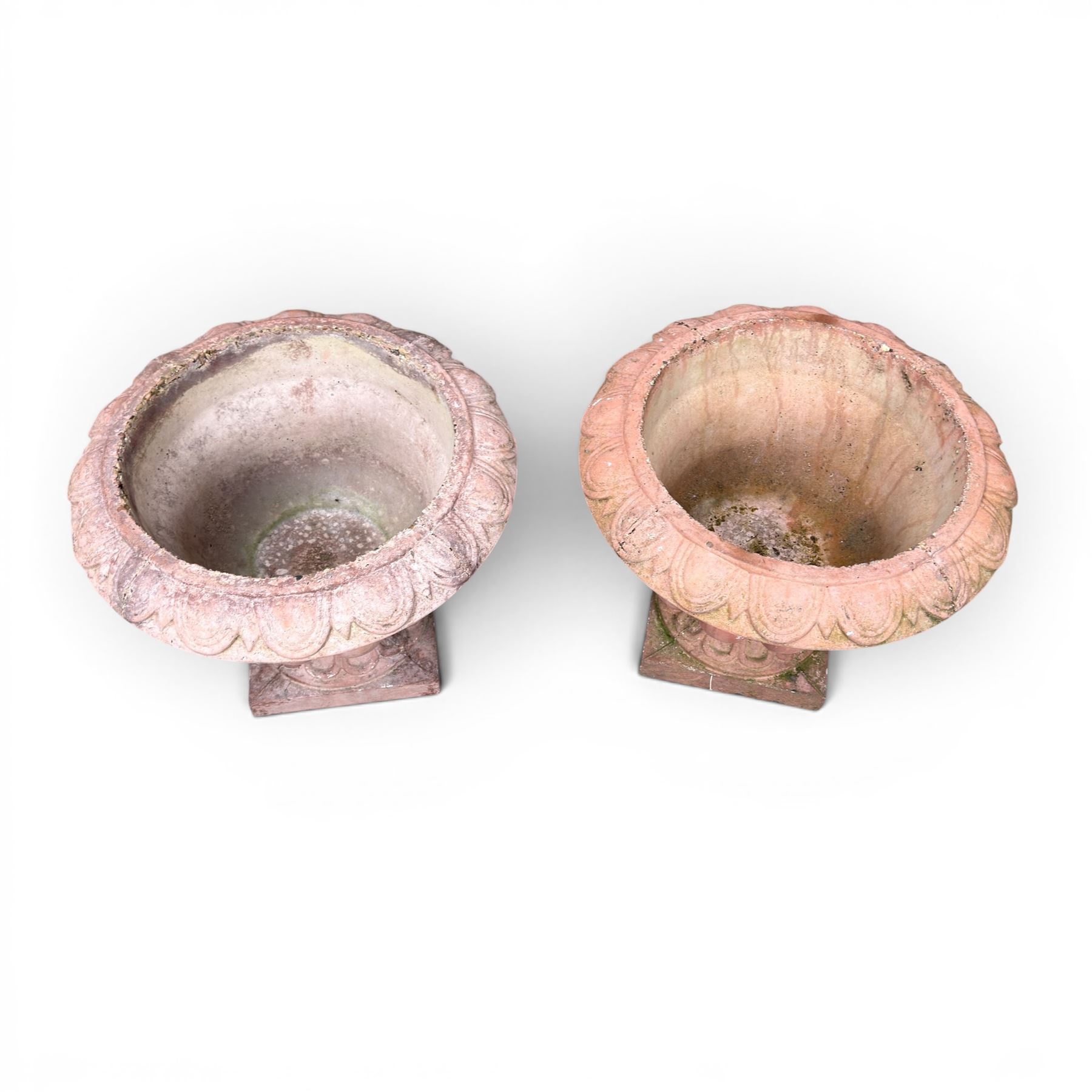 Pair of cast stone stone circular squat planters, egg and dart detail to rim, square base