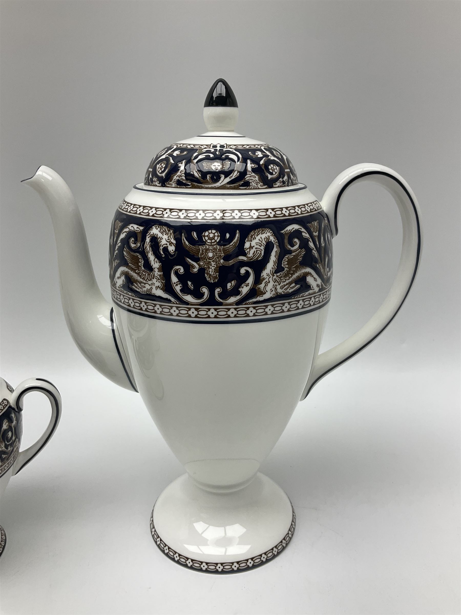 Wedgwood navy Florentine pattern coffee service for six, comprising coffeepot, coffee cans and saucers, milk jug, twin handled covered sucrier and small dish