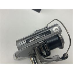 Four fixed spool reels, all in original boxes, comprising Shimano Ultegra 5500 XSD, with spare spool, Mitchell Autosurf 700, with spare spool, Shimano Sedona 600 FB with spare spool and D.A.M Quick 5001