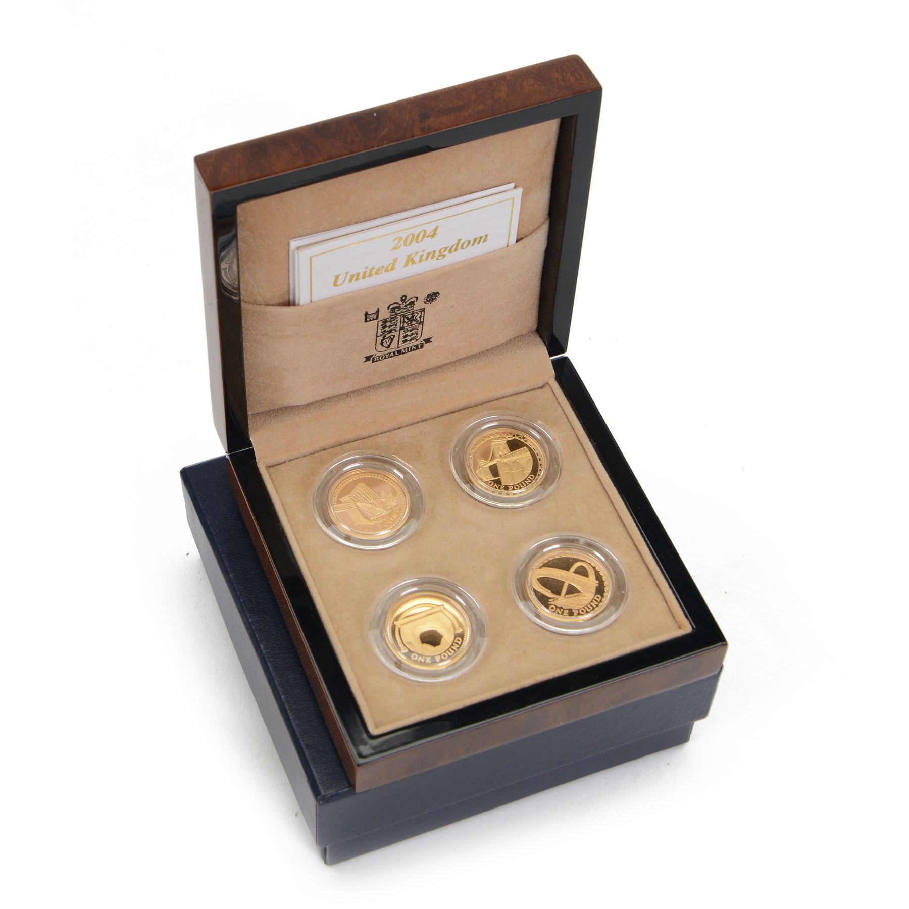 The Royal Mint United Kingdom gold proof one pound four coin set, comprising 2004 'Forth Rail Bridge', 2005 'Menai Straits Suspension Bridge', 2006 'Egyptian Arch Railway Bridge' and 2007 'Gateshead Millennium Bridge', housed in a display case with certificates