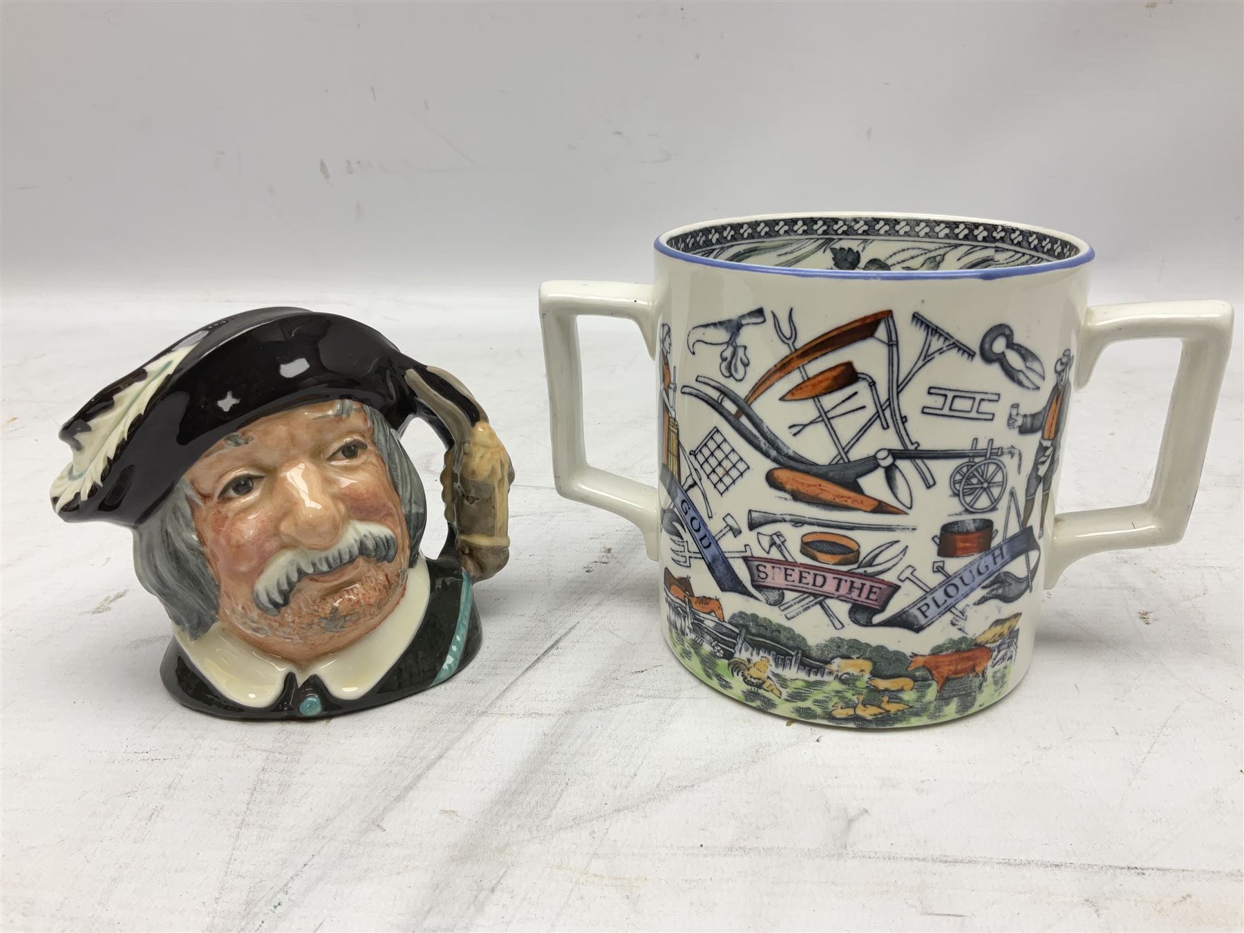 19th century 'God Speed the Plough' Harvest loving cup, together with  Royal Doulton Sanch Panca character jug no. D6461, Charlie Bear Megan and other collectables  