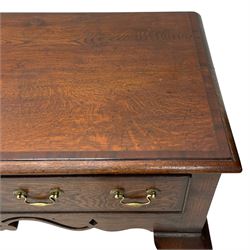 Georgian design oak and mahogany dresser base, the rectangular moulded top with mahogany band, three cocked-beaded and banded drawers over shaped a pierced apron, circular brass handle plates and swan neck handles, on C-scroll carved cabriole supports 
