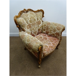  Victorian style beech framed armchair, carved scrolling frame, upholstered in a floral fabric, knuckle feet (W93cm), a carved oak framed upholstered salon chair, turned supports (W64cm) and another armchair (3)  