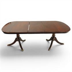 Georgian design mahogany twin pedestal extending dining table, rectangular rounded top on twin tripod pedestals with splayed supports, with additional leaf (W170cm D115cm H77cm); with set six (4+2) matching mahogany framed cameo-back dining chairs, upholstered in pale yellow lozenge patterned fabric (W57cm H94cm)