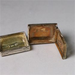 Two George III silver vinaigrettes, the first of rectangular form, the hinged cover modelled as a strap and engraved with acanthus leaves and flower heads, opening to reveal a foliate pierced gilt grille, hallmarked IT, Birmingham 1792, W2.5cm, the second of oval form, the hinged cover engraved 'C M Church' within a foliate border, opening to reveal diamond pierced gilt grille, hallmarked Cocks & Bettridge, Birmingham 1805, W2.5cm