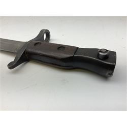 WW1 American Remington P14 rifle bayonet Model 1913, the 43cm fullered steel blade dated 5 17; in metal mounted leather scabbard L57cm overall; and WW1 Canadian Ross Rifle Co.1907 Model Mk.II bayonet, dated 2/17; in leather scabbard with frog (2)