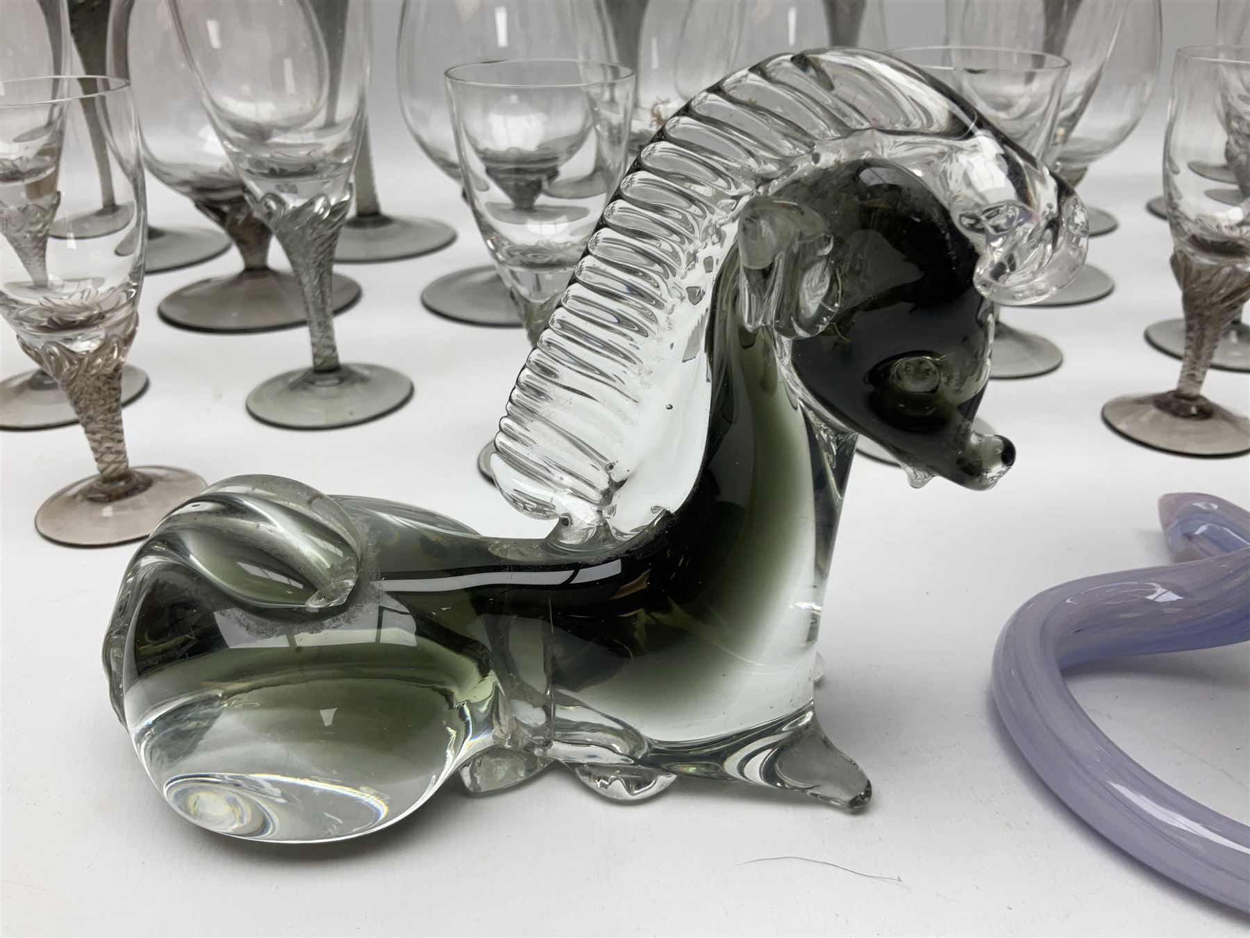 Murano glass figure of a recumbent horse, Murano Lavorazione purple and pink flower, and quantity of matching drinking glasses