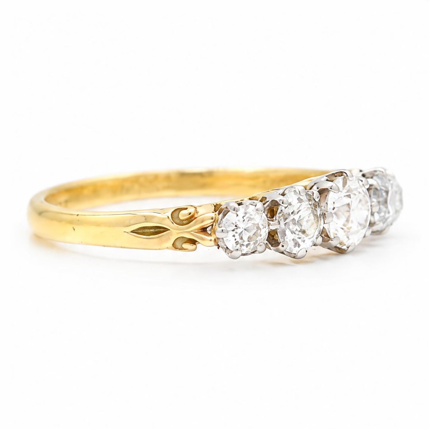 Gold diamond ring, set with five graduating old cut diamonds, stamped 18ct, total diamond weight approx 0.90 carat