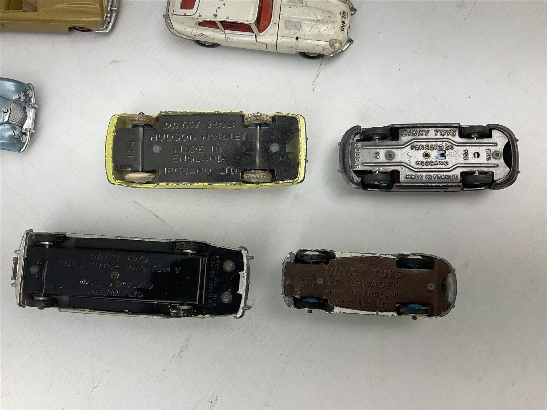 Dinky - thirteen unboxed and playworn/repainted early die-cast cars including Packard No.132, Austin A105 No.176, Rolls-Royce Silver Wraith No.150, Triumph Herald, Hillman Imp No.138, Rolls-Royce Phantom V No.198, Jaguar 'E' Type 2+2 No.131, Chevrolet El Camino No.449, French Panhard 24 No.524, Hudson Hornet No.174 etc; and Matchbox Dinky 1955 Bentley 'R' Type Continental (14)