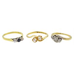 Early 20th century gold two stone diamond crossover ring, three stone diamond and sapphire ring and one other, all 18ct hallmarked or stamped