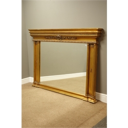  Regency style gilt framed over mantel mirror, projecting cornice above scrolled frieze, bevelled glass enclosed by four reeded pilasters, 169cm x 122cm  