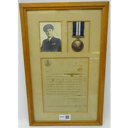  WWll DSM medal to CPO Telegraphist Robert Thomas Nestor, 'For Gallantry, Skill and Undaunted Devotion to Duty shown During the Landing of Allied Forces on the Coast of Normandy in June 1944' the award published in the London Gazette Supplement of 14th Noveber 1944, framed with letter and photograph, Robert Thomas Nestor, DJ77478, HMS Odyssey 1944.  