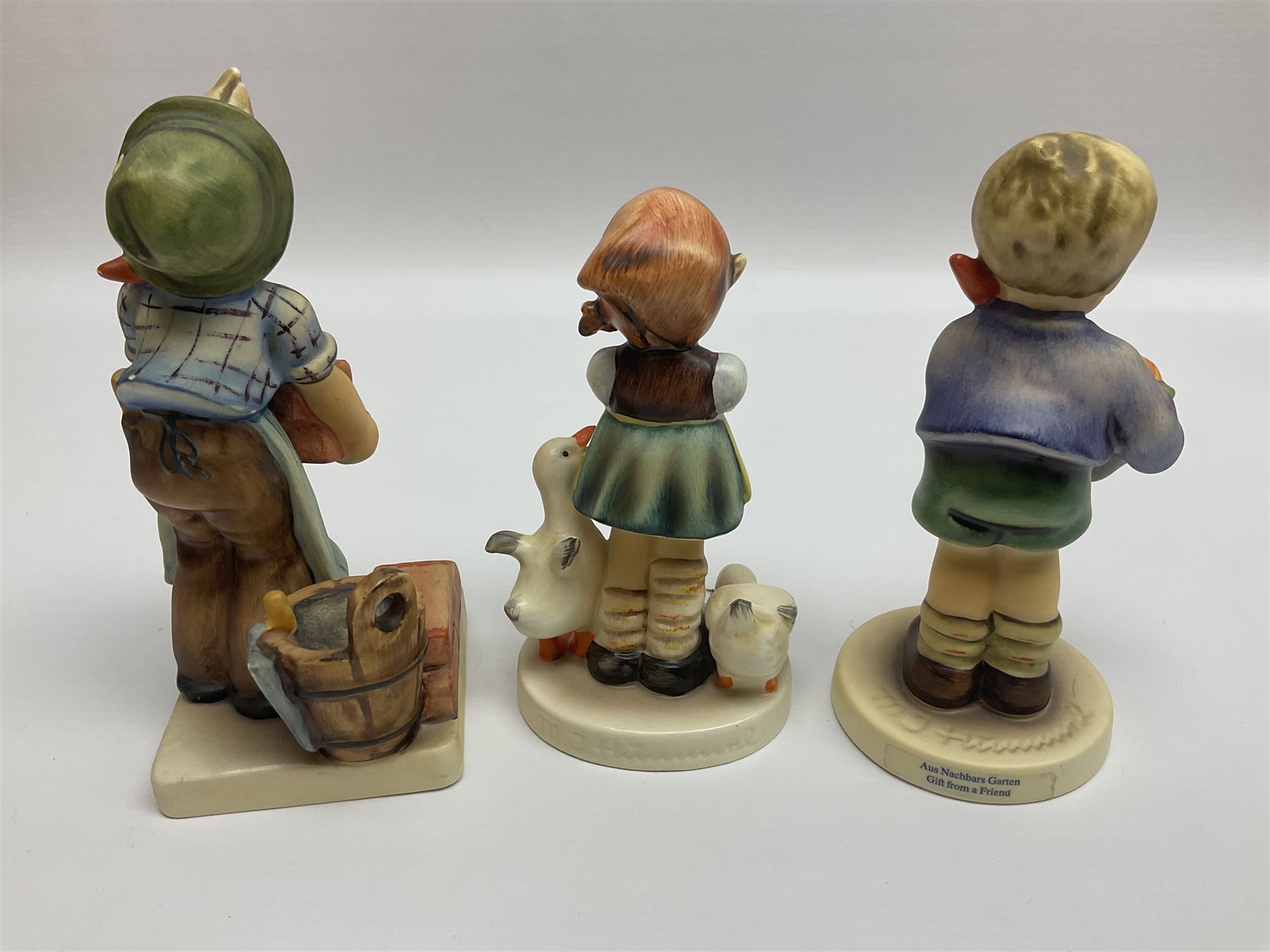 Twenty five Hummel figures by Goebel, to include Tuning up, Blessed Event, Book Worm, The Little Architect etc 