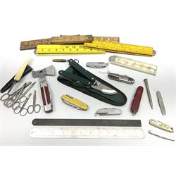 Pen knives including Victorinox, rolson multitool, sewing scissors, wooden and other folding rulers etc