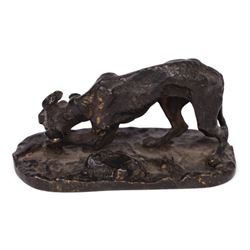 After R J Mene, bronze modelled as a dog with a bone, H5cm, L10cm 