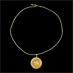 18ct gold torque necklace and photographic engraved pendant, stamped 750