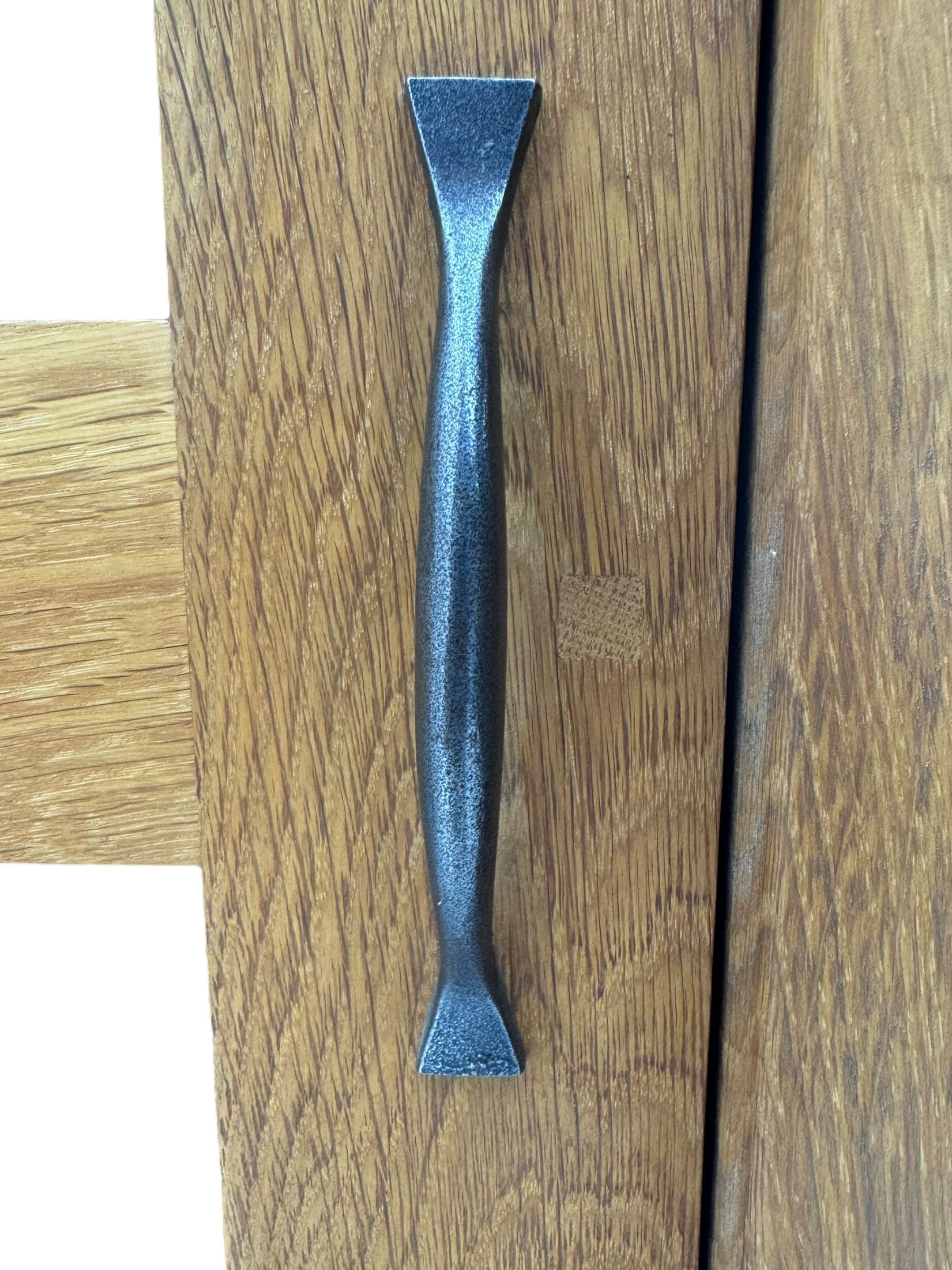 Laura Ashley - contemporary Milton oak display cabinet, featuring single door with two glass panels and pewter effect handle, enclosing one fixed oak shelf and two adjustable glass shelves, access hole at the bottom shelf, over single drawer with matching handle, on square legs