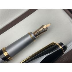 Circa 1930s Mentmore Auto Flow button fill fountain pen, the black barrel and cap with single narrow band and gold nib stamped Osmi Ridium 14ct, together with two gold nib fountain pens, each marked Huahong, the first stamped 14K 580, and second stamped 8K, both housed in Mentmore boxes (3)