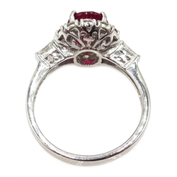  18ct white gold ruby and diamond cluster ring, with tapering baguette diamond shoulders, stamped 750, ruby approx 2.4 carat, diamonds approx 0.7 carat  