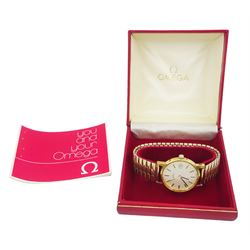 Omega gentleman's gold-plated and stainless steel manual wind wristwatch, Ref. 136.0104, Cal. 1030, silvered dial with baton hour markers and date aperture, on expanding gilt strap, boxed