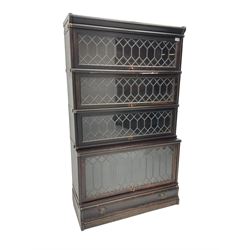 Globe Wernicke - early 20th century oak stacking library bookcase, enclosed by four lead glazed doors, fitted with single drawer