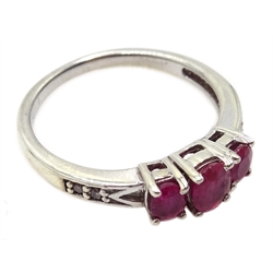  9ct white gold three stone ruby ring, with diamond shoulders, hallmarked  