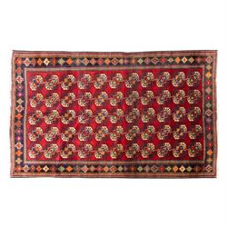 Tekke Bohara hand-knotted rug, madder red field decorated with an all-over design of repea...