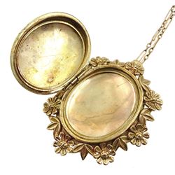 Gold hinged locket pendant/brooch, with foliate border, hallmarked, on 9ct gold link chain necklace