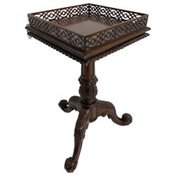 Chippendale design mahogany wine or urn table, square top with raised fretwork gallery over a gadrooned lower edge, fitted with pull-out slide, raised on turned and foliate carved vasiform pedestal with tripod base