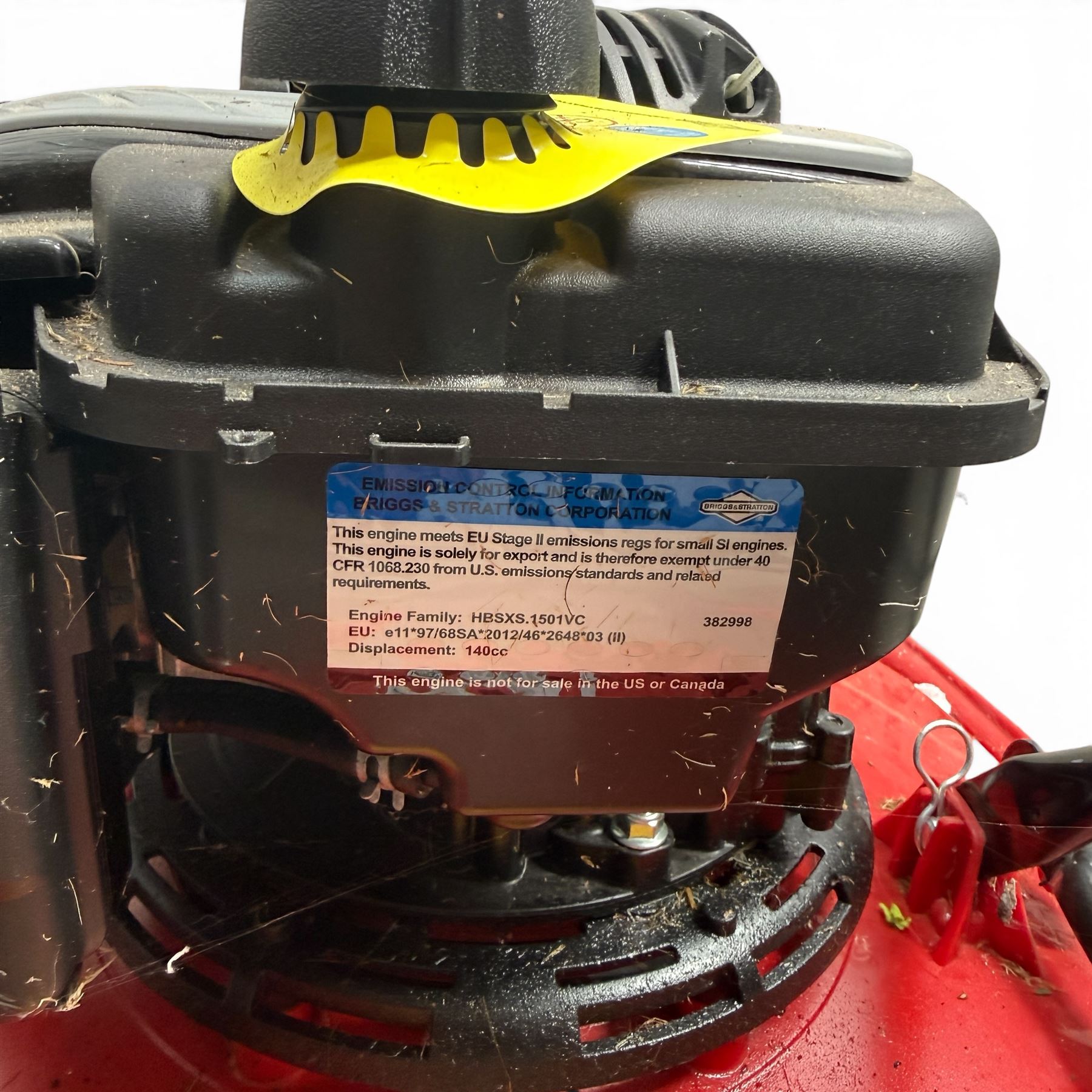 Cobra-  575ex petrol hover mower, with Briggs & Stratton engine, wheeled transport frame and red deck.