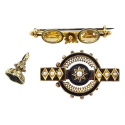 Victorian gold black enamel and split pearl mourning brooch, gold citrine brooch and a gold-plated fob mount