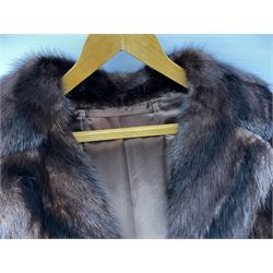 Ladies three quarter length brown mink coat, together with a ladies short black rabbit fur coat 