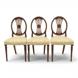 Bevan Funnell Reprodux - Regency design set of ten mahogany dining chairs, oval backs with central splat with rose motif, serpentine seat upholstered in damask fabric, raised on turned supports