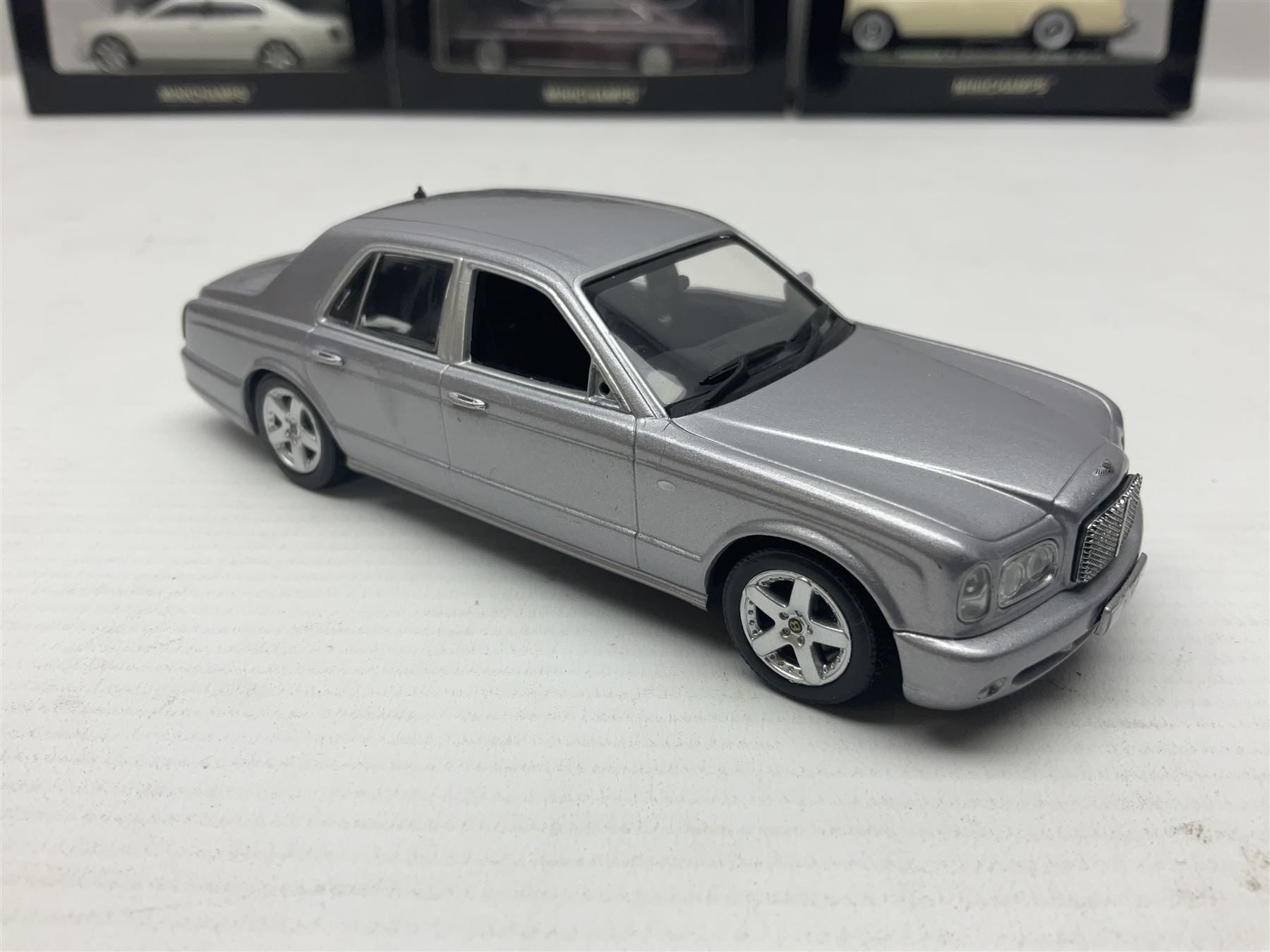 Nine Paul's Model Art 'Minichamps' 1:43 scale die-cast models - six boxed Bentleys and two unboxed Bentleys; and a Bedford estate van (9)