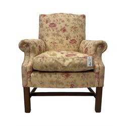 Peter Dudgeon - Georgian design mahogany framed armchair, shaped cresting rail over sprung back and seat flanked by rolled arms, upholstered in floral patterned fabric with matching seat cushion, on square supports joined by stretchers
Provenance: From the Estate of the late Dowager Lady St Oswald