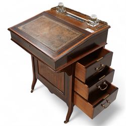 Edwardian inlaid mahogany Davenport desk, gilt metal gallery top with pen and ink stands over hinged top with inset leather writing surface, fitted with pigeon holes and small drawer, the right-hand side fitted with three drawers, on square supports with brass and ceramic castors 