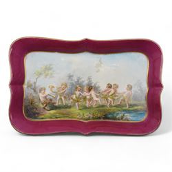 Early 20th century French porcelain tray, hand painted with dancing cherubs, within a pink and gilt border, inscribed 476 beneath, L25.5cm, pair of continental cherub figures, with blue anchor marks beneath, together with a Dresden porcelain pot pourri and cover, with pierced and floral decoration (4)