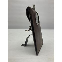 Early 20th century British Army officer's campaign clock in the form of a key-less wind nickel cased pocket watch with white dial, Roman numerals and subsidiary seconds dial, inscribed H. Williamson Ltd. London 9138F, the back with broad arrow and 9138F; in leather travelling case with dial aperture and brass easel support H14cm