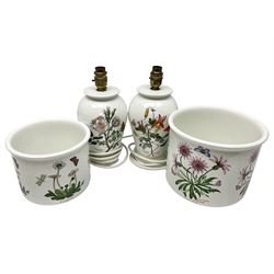 Two Portmeirion Botanic Garden table lamps, together with two Portmeirion Botanic Garden planters