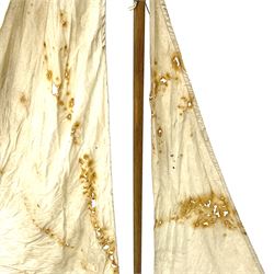 Large Victorian pond yacht, the planked hardwood hull with large lead weighted keel and working rudder, simulated planked deck and single mast with original sails; on later scratch-built wooden stand L117cm H151cm