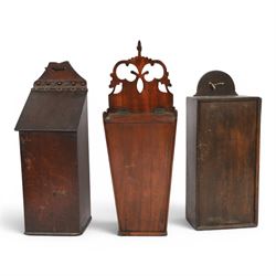 Three George III and later oak candle boxes, the first example of tapering form with shape...