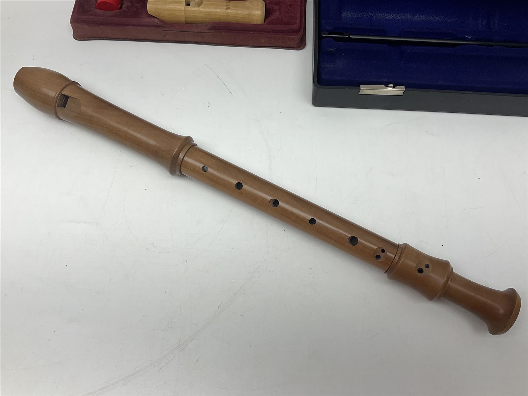 Three wooden recorders - 1970s Schotts 'Concert' three-piece tenor; 1990s Dolmetsch treble, cased; and 1980s Moech descant, cased (3)
