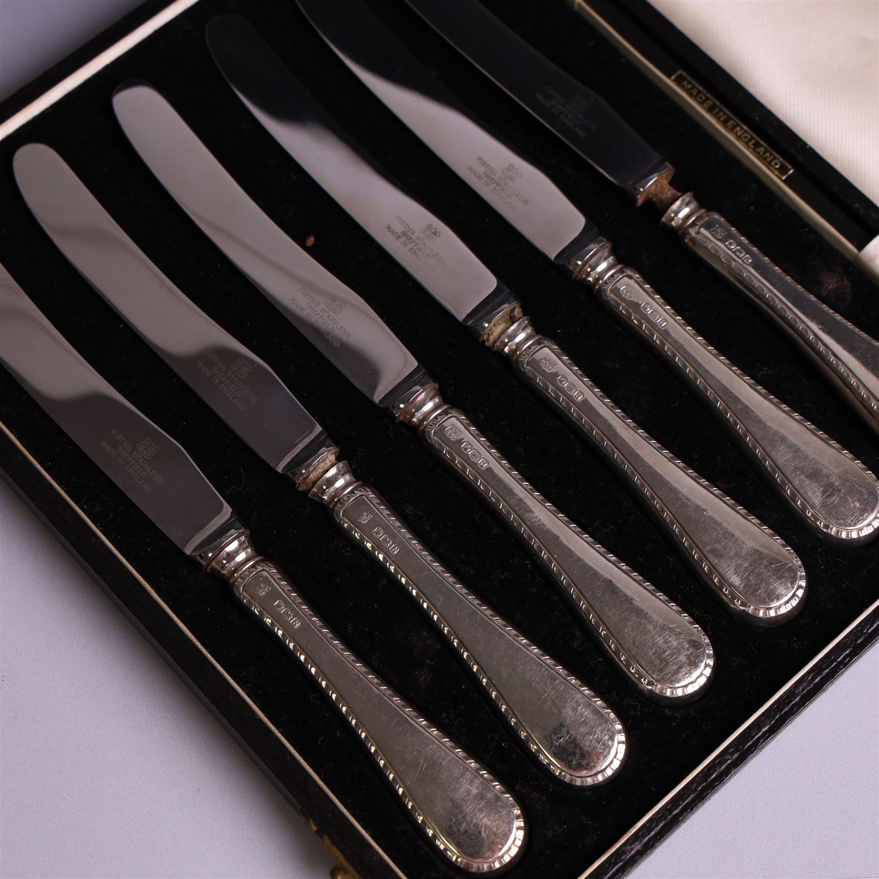 Pair of silver cruets, of baluster form and upon four pad feet, hallmarked Laurence R Watson & Co, Birmingham 1993, together with a set of six silver handled tea knives, hallmarked Barker Brothers Silver Ltd, Sheffield 1955, both in fitted cases