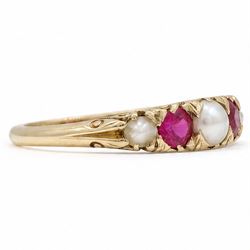 Early 20th century synthetic ruby and pearl ring, set with three split pearls and two round cut rubies, stamped 18ct