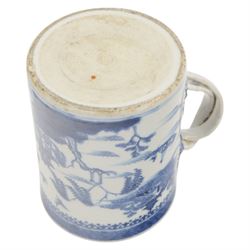 Large 18th century Chinese export blue and white tankard, of cylindrical form with foliate mounted strap handle, the body painted with a riverside landscape with pagodas, willows and pine trees, beneath a cell and spear head band to rim, H14cm D10.5cm