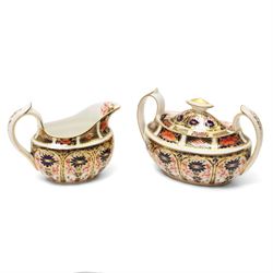 Royal Crown Derby pattern 1128 wares, comprising covered sucrier, milk jug, pair of coffee cans and saucers, teacup and saucer two small plates (D18cm) and one dinner plate 