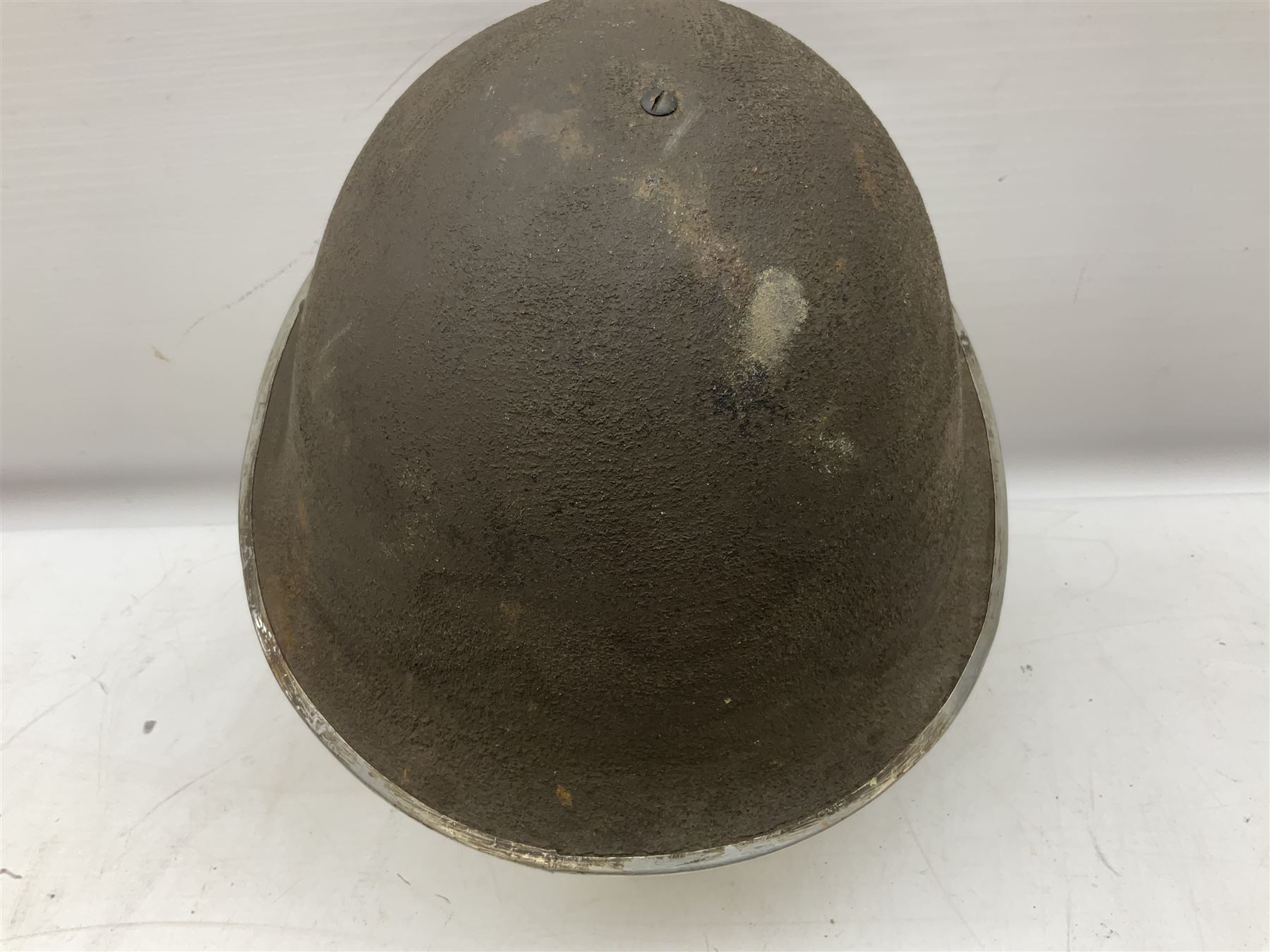 WW2 British Mk III steel combat helmet with textured finish and original liner