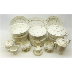  Limoges dinner service decorated with floral sprigs on plain ground comprising twenty-three dinner plates, seven soup bowls, eleven side plates, oval platter, tureen and cover and three serving dishes and a matched Limoges coffee set   